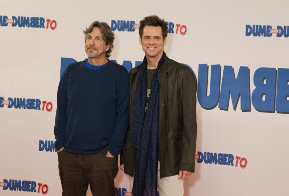 Peter Farrelly et Jim Carrey - Photocall du film "Dumb and Dumber" à l'hôtel Connaught à Londres. Le 20 novembre 2014 