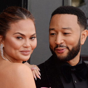 Chrissy Tiegen, John Legend au photocall de la 64ème édition des Grammy Awards au MGM Grand Garden à Las Vegas le 3 avril 2022. 