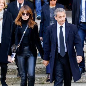 Carla Bruni-Sarkozy et Nicolas Sarkozy - Sorties des obsèques de Jean-Pierre Pernaut en la Basilique Sainte-Clotilde à Paris le 9 mars 2022