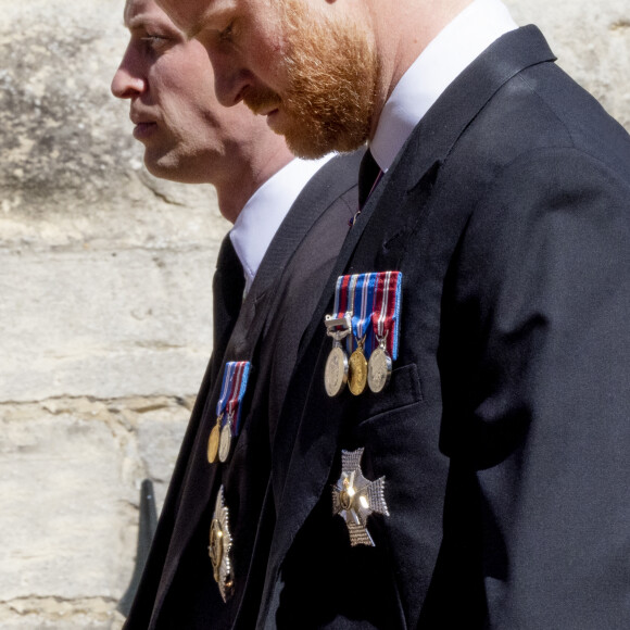 Le prince Harry, duc de Sussex, le prince William, duc de Cambridge - Arrivées aux funérailles du prince Philip, duc d'Edimbourg à la chapelle Saint-Georges du château de Windsor, le 17 avril 2021. 