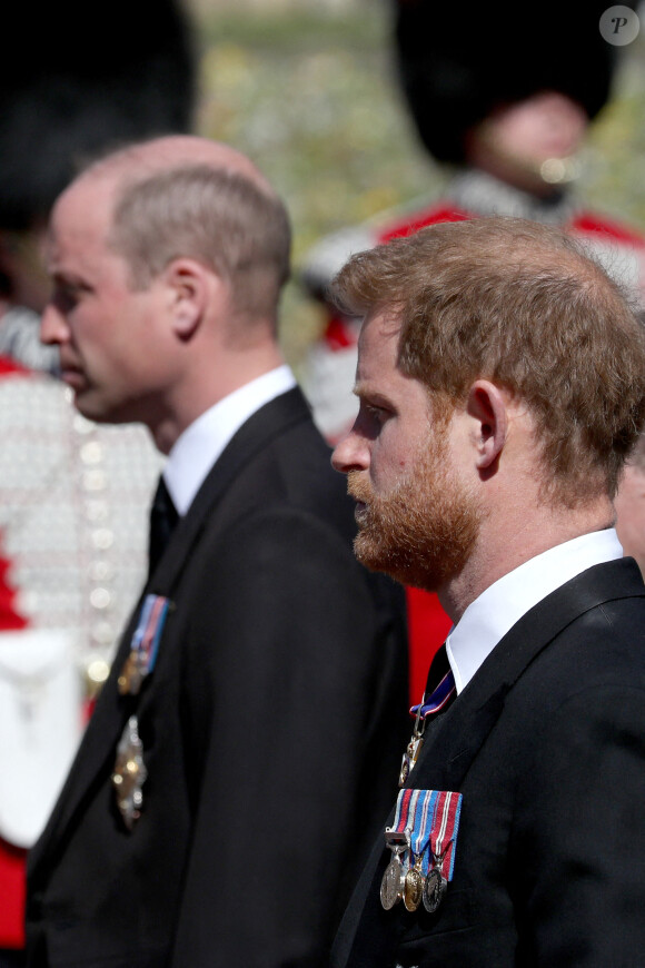 Le prince William, duc de Cambridge, le prince Harry, duc de Sussex - Arrivées aux funérailles du prince Philip, duc d'Edimbourg à la chapelle Saint-Georges du château de Windsor, le 17 avril 2021. 