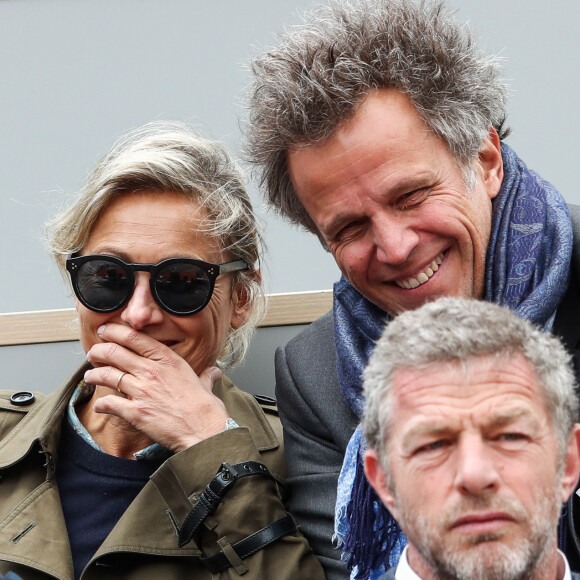 Anne-Sophie Lapix et son mari Arthur Sadoun dans les tribunes des internationaux de France de tennis de Roland Garros à Paris, France, le 7 juin 2019