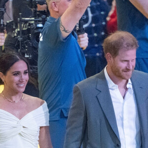 Le prince Harry et Meghan Markle lors de la cérémonie d'ouverture des Invictus Games 2020 à La Haye, le 16 avril 2022. 