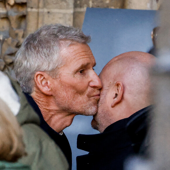 Denis Brogniart, Sébastien Cauet - Sorties des obsèques de Jean-Pierre Pernaut en la Basilique Sainte-Clotilde à Paris, France, le 9 mars 2022. © Cyril Moreau/Bestimage