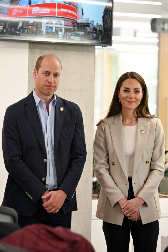 Le prince William, duc de Cambridge, et Catherine (Kate) Middleton, duchesse de Cambridge, visitent le comité d'urgence de Londres, à la rencontre de bénévoles de retour de leur mission humanitaire en Ukraine