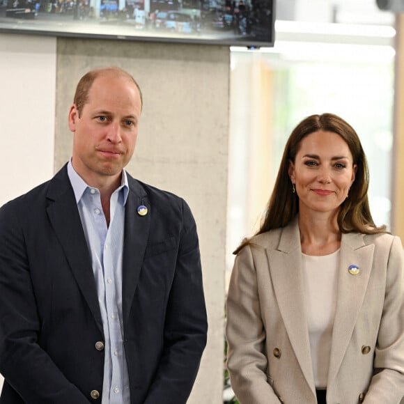 Le prince William, duc de Cambridge, et Catherine (Kate) Middleton, duchesse de Cambridge, visitent le comité d'urgence de Londres, à la rencontre de bénévoles de retour de leur mission humanitaire en Ukraine