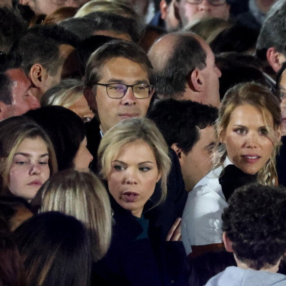 Tiphaine, Laurence et Sébastien Auzière, Edouard Philippe - La famille du président Emmanuel Macron est venue assister à son discours au Champ de Mars le soir de sa victoire à l'élection présidentielle 2022 le 24 avril 2022