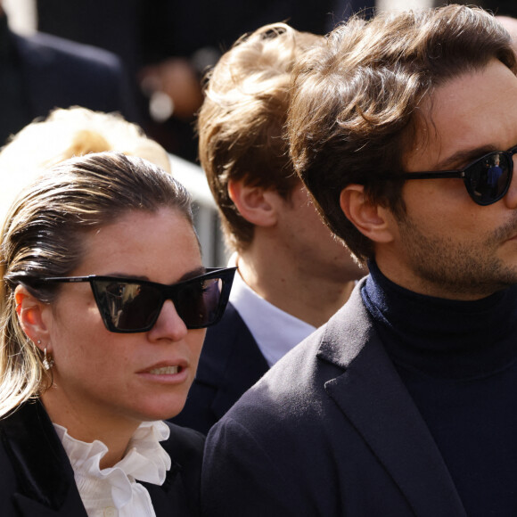 Sophie Tapie (Fille du défunt) et son mari Jean-Mathieu Marinetti - Sorties de la messe funéraire en hommage à Bernard Tapie en l'église Saint-Germain-des-Prés à Paris. Le 6 octobre 2021 © Jacovides-Moreau / Bestimage