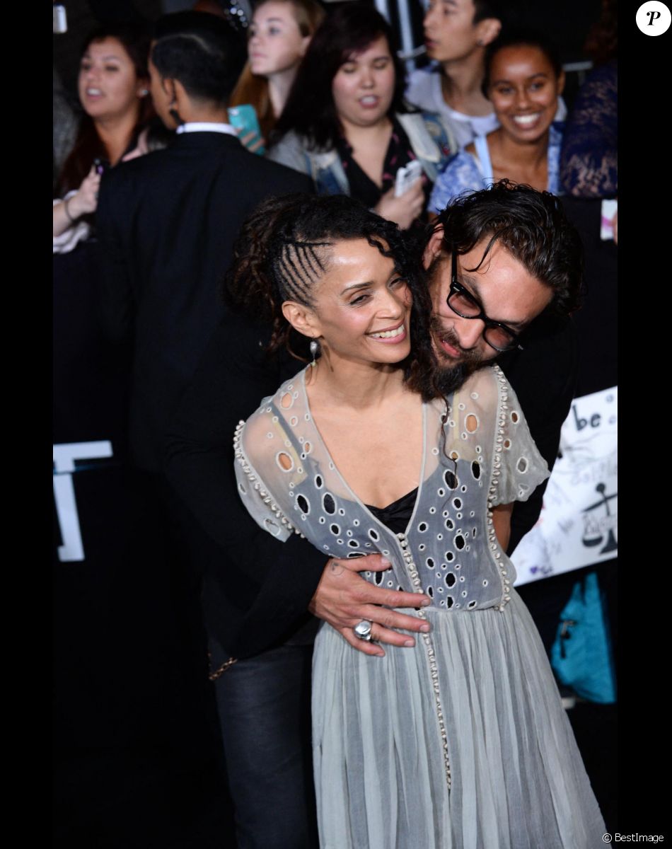Lisa Bonet et son mari Jason Momoa lors de la première du film "Divergent" au Regency Bruin Theatre à Los Angeles, le 18 mars 2014.