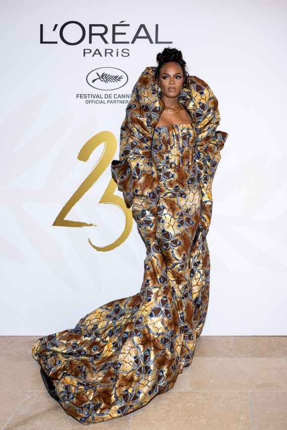 Didi Stone au photocall du dîner "L'Oréal" lors du 75ème Festival International du Film de Cannes, le 18 mai 2022. 
