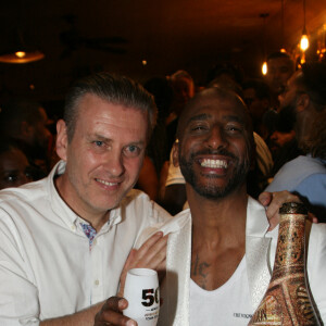 Exclusif - David Desclos, Stomy Bugsy - Stomy Bugsy fête son 50ème anniversaire à la fin de la représentation de la pièce "Un Jour j'irai à Détroit ! " au théâtre du Gymnase Marie-Bell à Paris le 21 mai 2022. © JLPPA/Bestimage