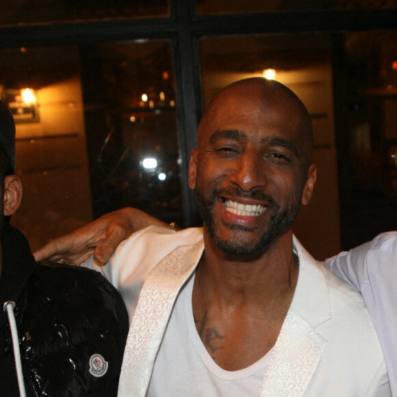 Exclusif - Stomy Bugsy avec son fils Bilal Duarte et son père - Stomy Bugsy fête son 50ème anniversaire à la fin de la représentation de la pièce "Un Jour j'irai à Détroit ! " au théâtre du Gymnase Marie-Bell à Paris le 21 mai 2022. © JLPPA/Bestimage