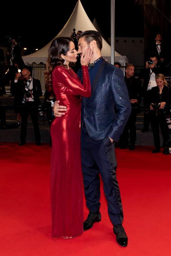 Delia Duran et Alex Belli - Montée des marches du film " Nostalgia " lors du 75ème Festival International du Film de Cannes. Le 24 mai 2022