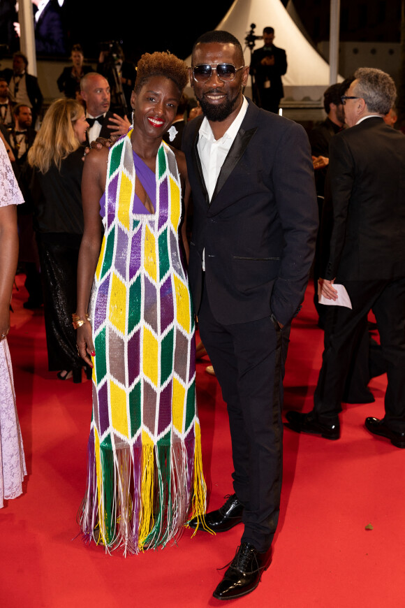 Rokhaya Diallo et Passi - Montée des marches du film " Nostalgia " lors du 75ème Festival International du Film de Cannes. Le 24 mai 2022
