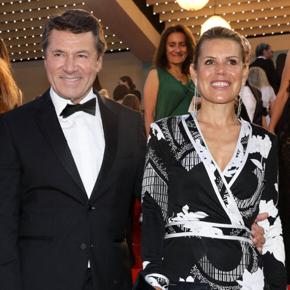 Gérard Holtz et sa femme Muriel Mayette-Holtz, Christian Estrosi et sa femme Laura Tenoudji-Estrosi - Montée des marches du film " Mascarade " lors du 75ème Festival International du Film de Cannes. Le 27 mai 2022 © Dominique Jacovides / Bestimage 