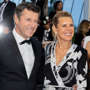 Christian Estrosi et sa femme Laura Tenoudji-Estrosi - Montée des marches du film " Mascarade " lors du 75ème Festival International du Film de Cannes. © Olivier Borde / Bestimage 
