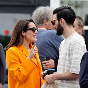 Sofia Essaïdi et son compagnon Adrien Galo au photocall du film "Nostalgia" lors du 75ème Festival International du Film de Cannes, le 25 mai 2022. © Dominique Jacovides / Bestimage