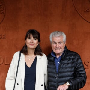 Claude Lelouch et sa compagne Valérie Perrin au village (jour 10) lors des Internationaux de France de Tennis de Roland Garros 2022 à Paris, France, le 31 mai 2022. © Dominique Jacovides/Bestimage 