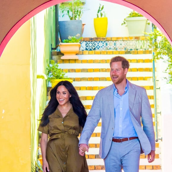 Le prince Harry, duc de Sussex, et Meghan Markle, duchesse de Sussex, lors des célébrations de la fête du patrimoine dans le quartier de Bo Kaap dit "Cape Malay" au Cap, Afrique du Sud, le 24 septembre 2019.