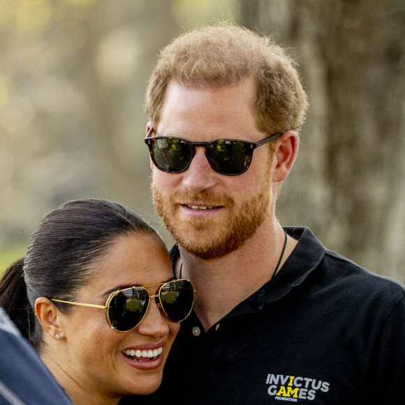 Le prince Harry et Meghan Markle lors du "Land Rover Challenge" au premier jour des Invictus Games 2020 à La Haye, le 16 avril 2022.