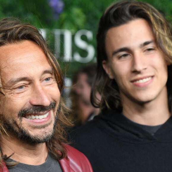 Bob Sinclar et son fils Raphaël Le Friant - Soirée caritative "LuisaViaRoma" pour l'UNICEF à Saint-Barthélemy dans les Caraïbes le 29 décembre 2021.