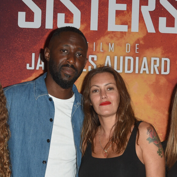 Barbara Rocher (fille de Karole Roche, Karole Rocher et son compagnon Thomas Ngijol, Gina Rocher (fille de Karole Rocher) - Avant-première du film "Les frères sisters" au cinéma l'UGC Normandie à Paris le 11 septembre 2018. © Coadic Guirec/Bestimage