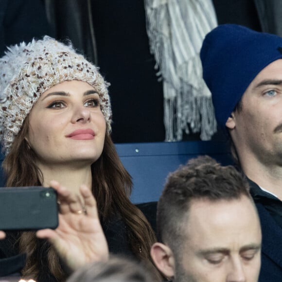 Camille Lacourt et sa compagne Alice Detollenaere (Miss Bourgogne 2010) dans les tribunes lors du match de championnat de Ligue 1 Conforama opposant le Paris Saint-Germain (PSG) aux Girondins de Bordeaux au Parc des Princes à Paris, France, le 23 février 2020. Le PSG a gagné 4-3. © Cyril Moreau/Bestimage 