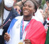 Clarisse Agbegnenou et l'équipe de France de Judo médaillée des jeux olympiques de Tokyo célébrés au Trocadéro à Paris, le 3 août 2021.