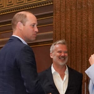 Le prince William, duc de Cambridge, et Catherine (Kate) Middleton, duchesse de Cambridge, découvrent leur portrait de l'artiste Jamie Coreth au musée Fitzwilliam de l'Université de Cambridge, Royaume Uni, le 23 juin 2022.