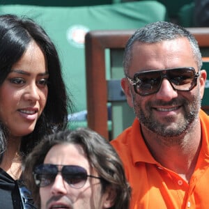 Amel Bent et Patrick Antonelli - People aux Internationaux de France de tennis de Roland Garros à Paris, le 5 juin 2014. 