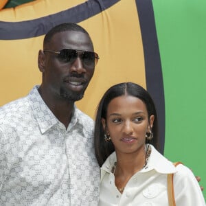 Omar Sy et sa fille Selly Sy - Photocall du défilé de mode Hommes "Louis Vuitton" Prêt-à-porter Printemps-Été 2023 au Musée du Louvre à Paris. Le 23 juin 2022 © Olivier Borde / Bestimage 