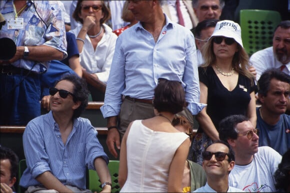 Michel Berger, guest et France Gall dans les tribunes des internationaux de Roland Garros en mai 1992