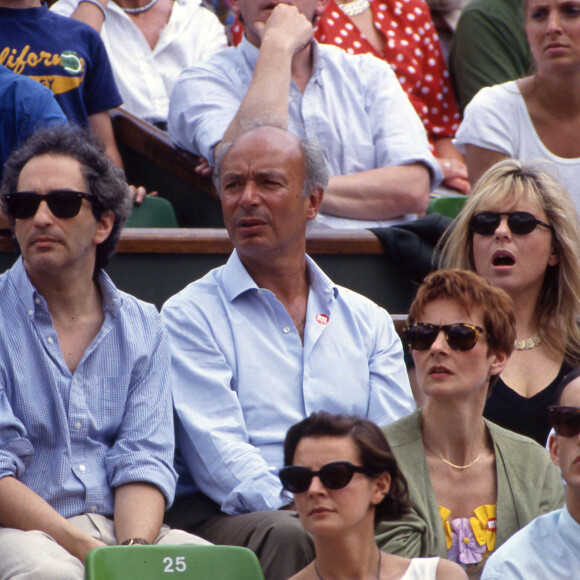 Michel Berger, guest et France Gall dans les tribunes des internationaux de Roland Garros en mai 1992