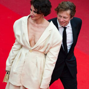 Mathieu Amalric et Jeanne Balibar à la montée des marches du film "Nelyubov (Faute d'amour)" lors du 70ème Festival International du Film de Cannes, le 18 mai 2017. 
