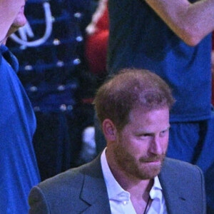 Le prince Harry et Meghan Markle lors de la cérémonie d'ouverture des Invictus Games 2020 à La Haye, le 16 avril 2022. 