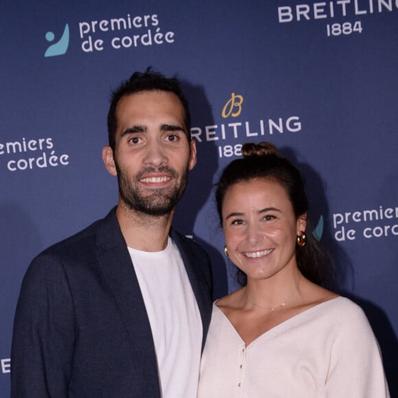 Martin Fourcade et Johanne Defay - Dîner de charité Breitling pour l'association "Premiers de cordée" à la Samaritaine à Paris le 8 octobre 2021.  © Rachid Bellak / Bestimage 