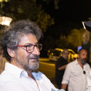 Abd Al Malik, Radu Mihaileanu - Personnalités à la représentation de la pièce "Un visiteur inattendu" lors du festival de Ramatuelle au théâtre de Verdure le 11 août 2022. © Cyril Bruneau / Festival de Ramatuelle / Bestimage