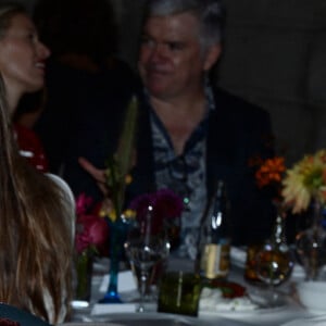 Pier Paolo Piccioli et Linda Evangelista lors du dîner de la soirée "Vogue 50 Archive" lors de la fashion week de Milan, le 21 septembre 2014. 