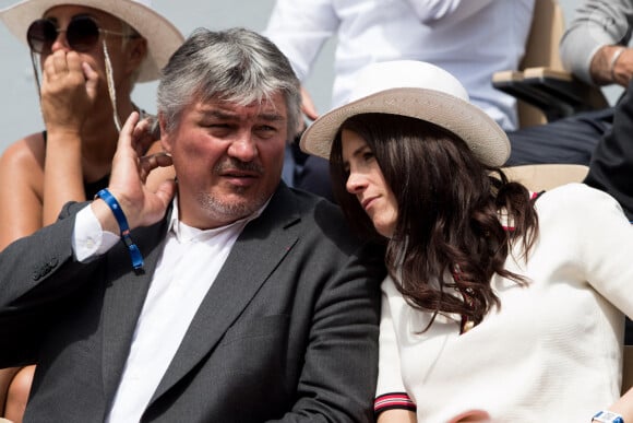 David Douillet et sa femme Vanessa dans les tribunes des Internationaux de France de Tennis de Roland Garros 2019 à Paris, le 29 mai 2019. © Jacovides-Moreau/Bestimage