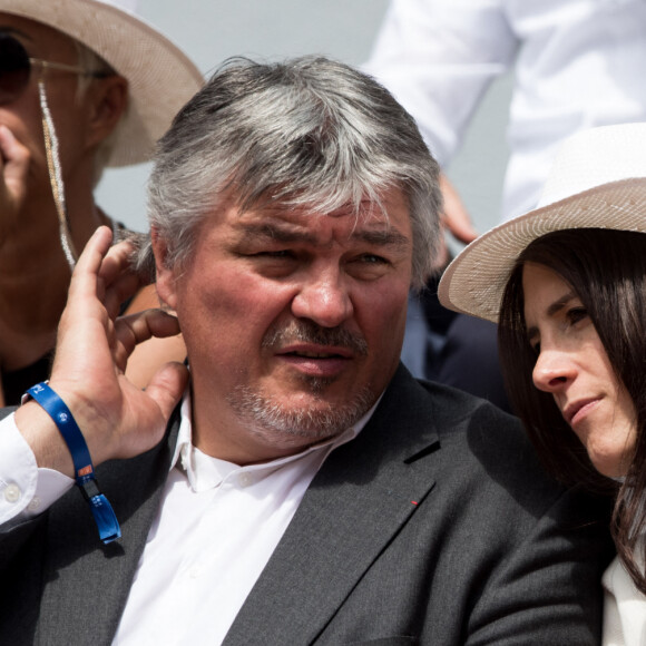 David Douillet et sa femme Vanessa dans les tribunes des Internationaux de France de Tennis de Roland Garros 2019 à Paris, le 29 mai 2019. © Jacovides-Moreau/Bestimage