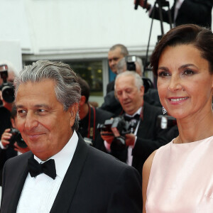 Christian Clavier et sa femme Isabelle De Araujo (Bijoux APM Monaco) - Montée des marches du film "Jimmy's Hall" lors du 67 ème Festival du film de Cannes – Cannes le 22 mai 2014. 
