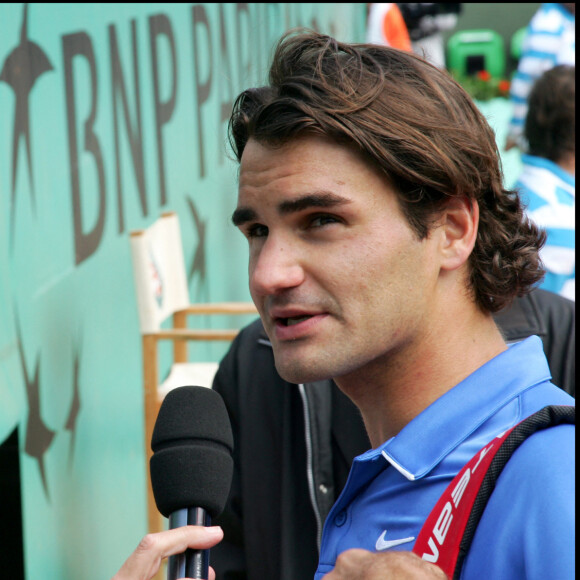 Nelson Monfort et Roger Federer à Roland Garros en 2006.