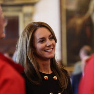 Catherine (Kate) Middleton, princesse de Galles, rencontre des bénévoles et du personnel opérationnel au Windsor Guildhall à Windsor, Royaume Uni, le 22 septembre 2022, afin de les remercier de leur implication dlors des funérailles de la La reine Elisabeth II au château de Windsor. 