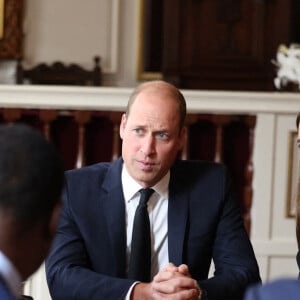 Le prince William, prince de Galles, et Catherine (Kate) Middleton, princesse de Galles, rencontrent des bénévoles et du personnel opérationnel au Windsor Guildhall à Windsor, Royaume Uni, le 22 septembre 2022, afin de les remercier de leur implication dlors des funérailles de la La reine Elisabeth II au château de Windsor. 