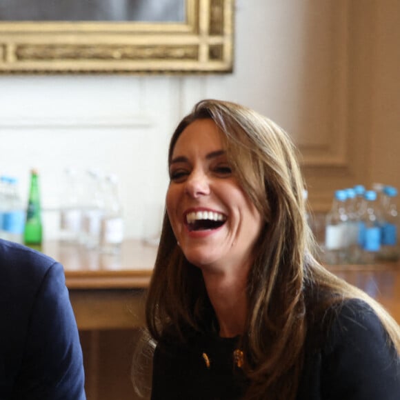 Le prince William, prince de Galles, et Catherine (Kate) Middleton, princesse de Galles, rencontrent des bénévoles et du personnel opérationnel au Windsor Guildhall à Windsor, Royaume Uni, le 22 septembre 2022, afin de les remercier de leur implication dlors des funérailles de la La reine Elisabeth II au château de Windsor. 