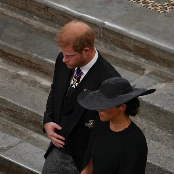 Le prince Harry, duc de Sussex et Meghan Markle, duchesse de Sussex - Service funéraire à l'Abbaye de Westminster pour les funérailles d'Etat de la reine Elizabeth II d'Angleterre. Le sermon est délivré par l'archevêque de Canterbury Justin Welby (chef spirituel de l'Eglise anglicane) au côté du doyen de Westminster David Hoyle. Londres, le 19 septembre 2022. © Gareth Fuller / Bestimage