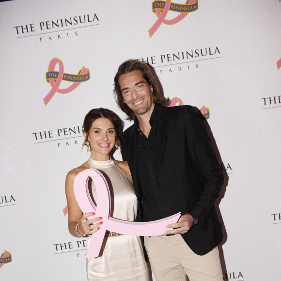 Exclusif - Camille Lacourt et sa compagne Alice Detollenaere - Soirée de gala au profit de l'association "Europa Donna France", organisée par Hotel Peninsula. Paris, le 29 septembre 2022. © Christophe Clovis-Rachid Bellak / Bestimage