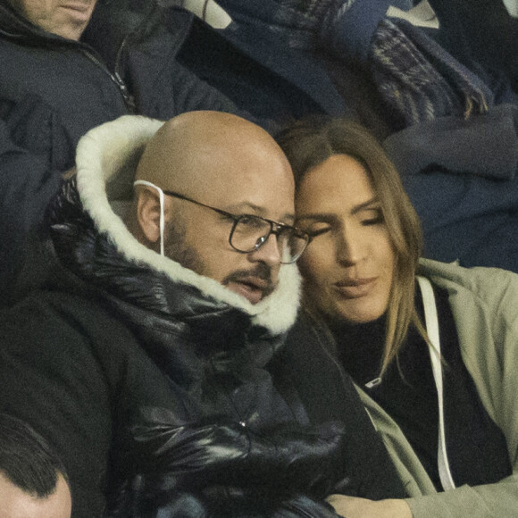 Vitaa (enceinte de son 3ème enfant) et son mari Hicham Bendaoud - People lors de la huitième de finale aller de la Ligue des champions entre le PSG et le Real Madrid au Parc des Princes à Paris le 15 février 2022. © Cyril Moreau/Bestimage.