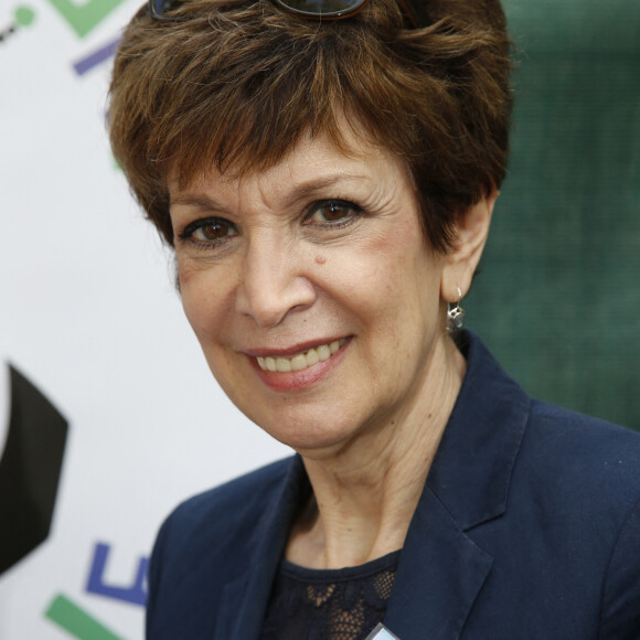 Catherine Laborde lors de la Journée mondiale des oubliés des vacances de l'association du Secours populaire sur le Champ-de-Mars à Paris, le 19 août 2015.