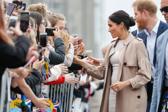 Le prince Harry, duc de Sussex, et Meghan Markle, duchesse de Sussex, ont été accueillis par une foule de supporters au Viaduct Harbour à Auckland, Nouvelle-Zélande, le 30 octobre 2018. 